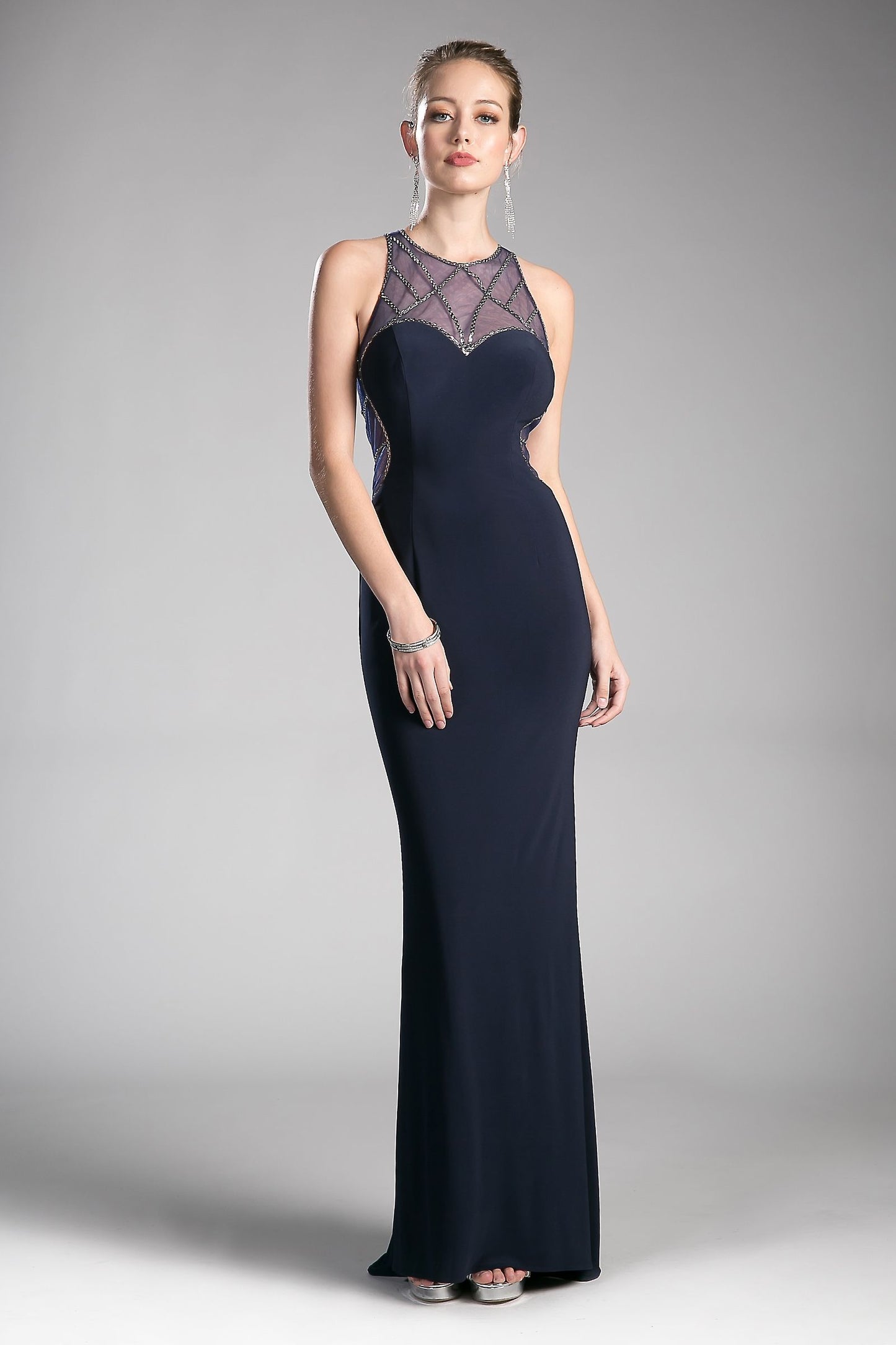 Fitted stretch jersey gown with beaded illusion details and sweetheart neckline.